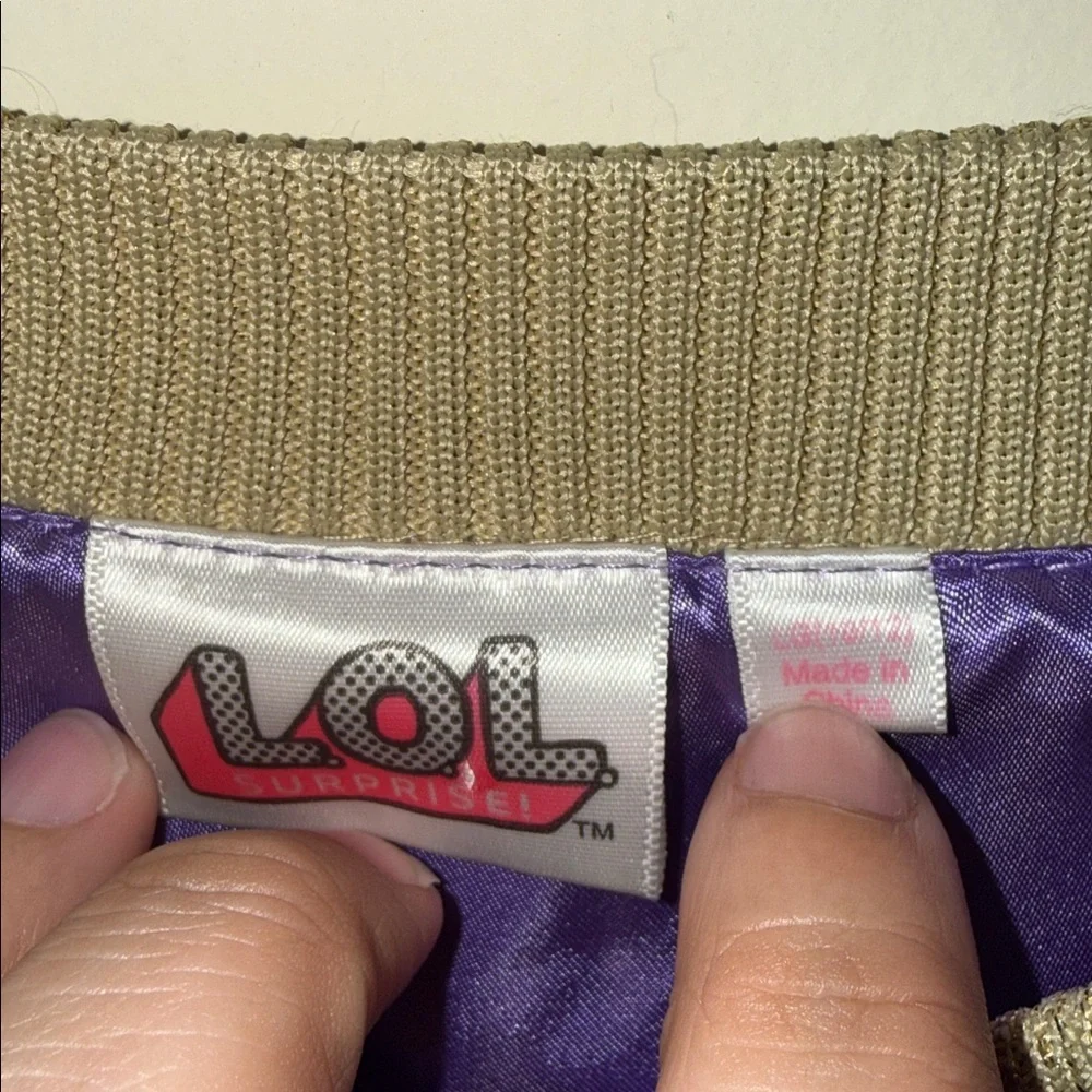 L.O.L. Surprise! Purple Satin Jacket with Gold Trim and White Tag